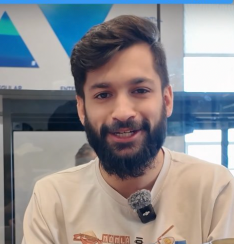 Anish Kale being interviewed about specialty coffee and brewing workshops
